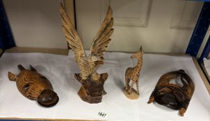 A quantity of wooden masks etc.