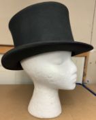 A collapsible top hat by Tress & Co London, made for Cecil Gee, London