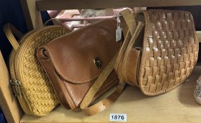 A leather weave cross body bag, a Fossil leather bag & 1 other