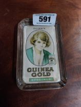 Ogden's Guinea Gold glass ashtray. {15 cm H x 9 cm W}.