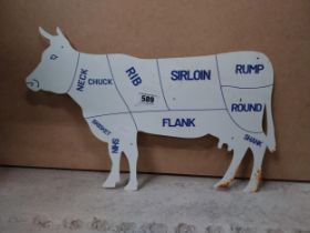 Tin plate Butchers advertisement in the form of a Cow. {23 cm H x 49 cm W}.