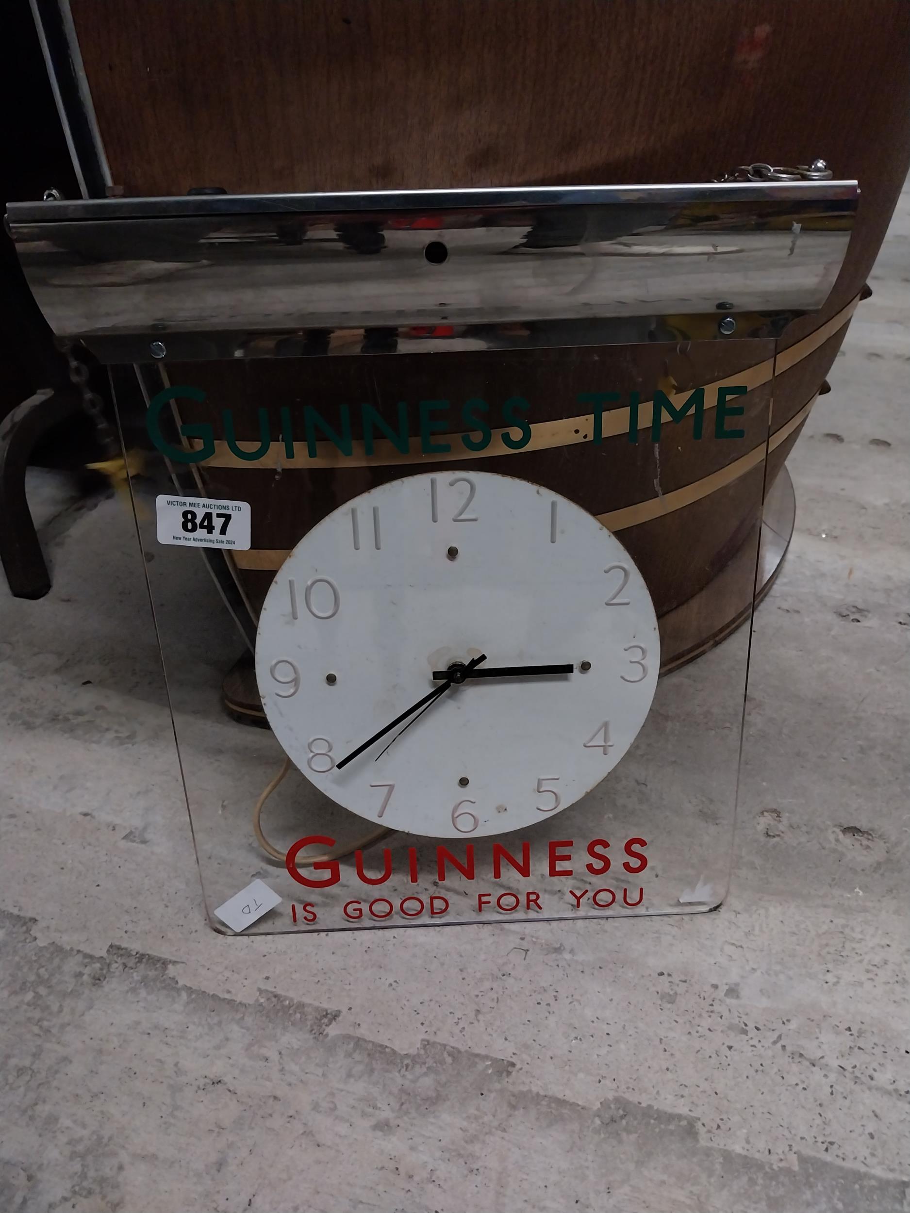 Guinness is Good for you chrome and Perspex hanging advertising clock. {41 cm H x 36 cm W}.