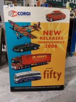 50th Anniversary Corgi model cars cardboard advertising showcard. {85 cm H x 60