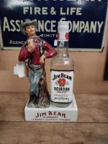 Jim Beam Kentucky Bourbon ceramic advertising bottle holder in the form of a Cowboy and bottle. {