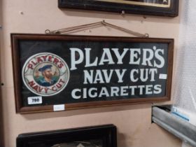 Player's Navy Cut Cigarettes framed advertising showcard. {27 cm H x 62 cm W}.