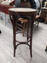 Two bentwood bar stools. {80 cm H x 37 cm Dia.}.