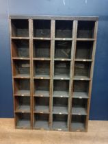 Metal twenty four pigeon hole cabinet {H 180cm x W 124cm x D 31cm }.