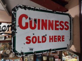 Guinness Sold Here double sided enamel advertising sign. {21 cm H x 47 cm W}