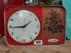 1950's Carroll's No 1 advertising clock. {32 cm h x 23 cm W}.