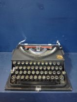 Imperial portable typewriter {H10cm x W 30cm x D 30cm }.