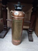 19th C. Guardienne copper and brass fire extinguisher. {61 cm H x 19 cm W}.