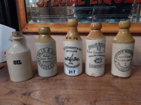 Collection of four stoneware Ginger beer bottes - W G O'Doherty Londonderry, Queen's Brewery Poulton