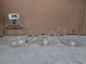 Three Guinness Waterford crystal glasses - 3 pint, 1 pint and half pint. {17 cm H, 12 cm H and 10 cm