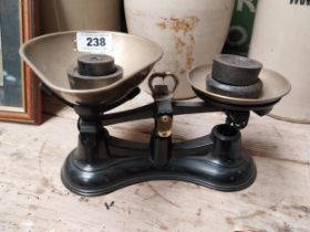 Brass and cast iron Sweet scales with weights. {16 cm H x 29 cm W x 19 cm D}.
