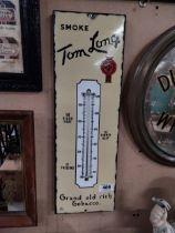 Smoke Tom Long Grand old rich tobacco enamel advertising barometer. {57 cm H x 18 cm W}