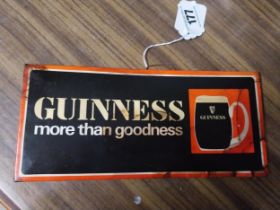 Guinness More Than Goodness celluloid shelf advertising sign. {13 cm H x 28 cm W}.