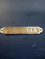 Brass wine bar sign {H 3cm x W 20cm }.