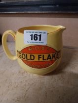 Wills's Gold Flake ceramic advertising water jug. {11 cm H x 16 cm W x 12 cm D}.