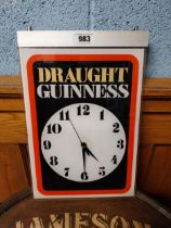 Draught Guinness Perspex battery hanging advertising clock. {42 cm H x 28 cm W}.
