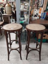 Two bentwood bar stools. {80 cm H x 37 cm Dia.}.