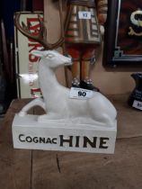 Cognac Hine Ruberoid advertising figure. {25 cm H x 22 cm W x 6 cm D}.