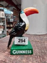 Cast iron Guinness Toucan. {15 cm H x 11 cm W x 7 cm D}.