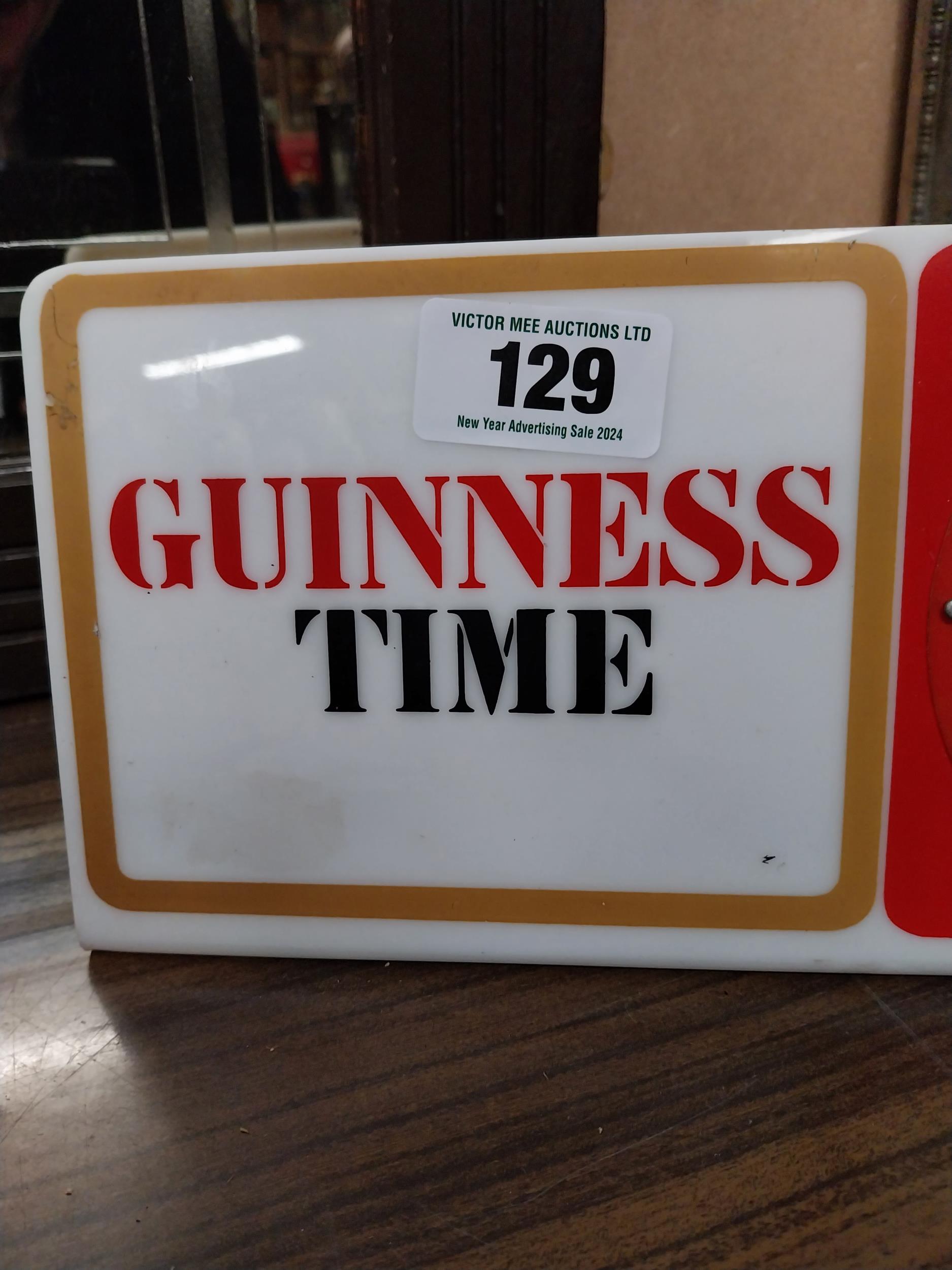 Guinness Time Perspex battery operated advertising clock. {15 cm H x 30 cm W}. - Image 5 of 8