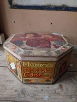 Mommy's Rich Fruit Cake adverting tin. {11 cm H x 24 cm Dia.}.