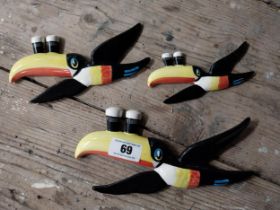 Set of three ceramic Guinness Flying Toucans. {16 cm H x 27 cm W and 8 cm H x 17 cm W}.