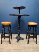 Pair of high Tudor bar - pub stools with leather upholstered seats {H 76cm x Dia 34cm }.