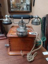 Early 1900's mahogany and chrome telephone. {24 cm H x 19 cm W x 19 cm D}