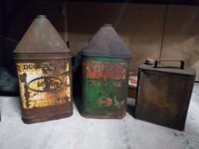 Three oil drums - Esso Agricastrol, Duckham's and another. {51 cm H x 26 cm W x 26 cm D} and {32