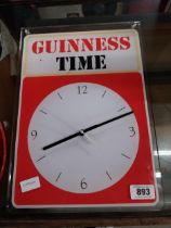 Guinness Perspex battery advertising clock. {43 cm H x 31 cm W}.