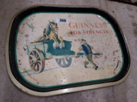 Guinness for Strength tinplate drinks tray. {22 cm H x 42 cm W}.