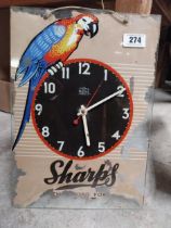 1960's Sharps glass battery advertising clock. {43 cm H x 30 cm W}.