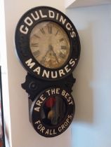 Early 20th C. Goulding Manure wall advertising clock {80 cm H x 47 cm W x 15 cm D#}.