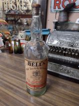 Bells Old Scotch Whiskey advertising bottle. {53 cm H x 14 cm Dia.}