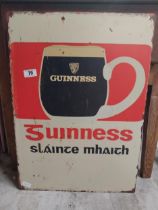 Guinness tinplate bilingual advertising sign. {70 cm H x 50 cm W}.