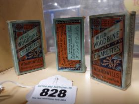 Three Woodbine Cigarette advertising packets. {7 cm H x 4 cm W x 2 cm D}.