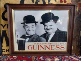 Guinness Laurel and Hardy advertising print mounted in oak frame {47 cm H x 57 cm W }.