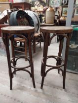 Two bentwood bar stools. {80 cm H x 37 cm Dia.}.