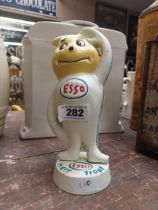 Cast iron Model of Esso man. {23 cm H x 10 cm W x 9 cm D}.