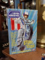 Rare Evil Knievel Stunt Cycle in original box. {34 cm H x 23 cm W x 10 cm D}.