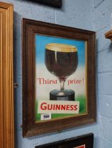 Framed Thirst Prize Guinness advertising print mounted in oak frame. {46 cm H x 36 cm W}.