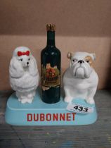 Dubonnet ceramic advertising figure of Poodle and Bulldog by Beswick. {18 cm H x 19 cm W x 10 cm