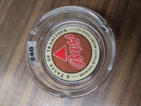 The Taste of tradition Bass glass advertising ashtray {4 cm H x 15 cm Dia.}.