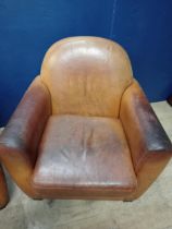 Pair of tan leather club chairs { 83cm H X 86cm W X 80cm D }.