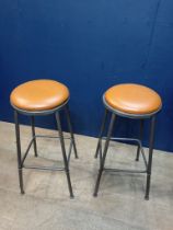 Pair of metal industrial stools with leather upholstered seats. { 78cm H X 35cm Dia }.