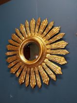 Decorative gilt Sunburst mirror {70 cm Dia.}.
