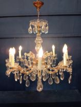 Eight branch brass and crystal chandelier { 90cm H X 70cm Dia }.